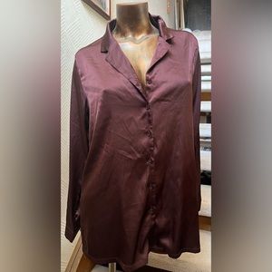 Comfy blouse for the office! Runs long.